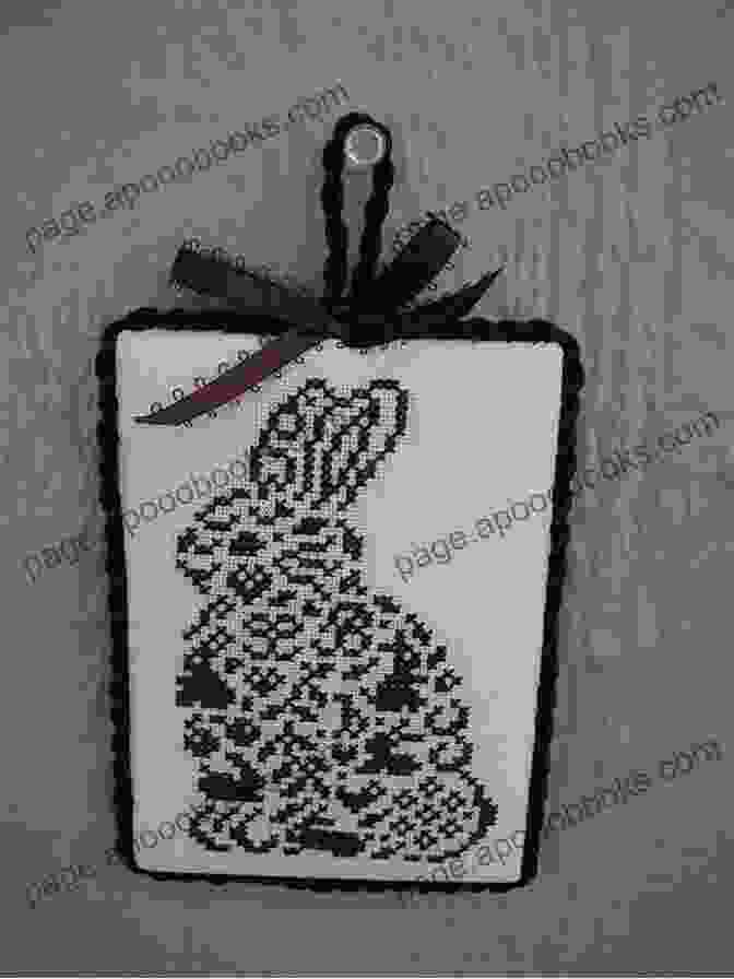 A Vibrant And Detailed Cross Stitch Of A Chocolate Bunny Sitting Amidst Easter Eggs Chocolate Bunny Cross Stitch Pattern