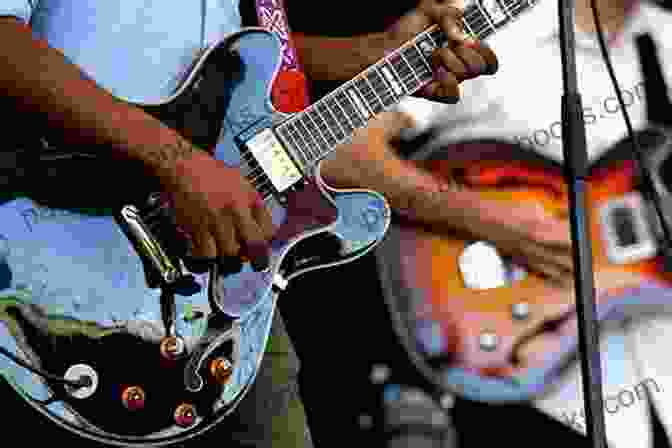 A Vibrant Image Of Latino Musicians Performing On Stage, Guitars In Hand Latinos And American Popular Culture