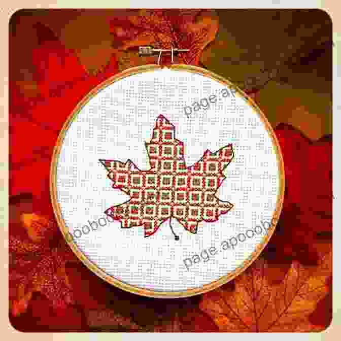 Magnified Close Up Of The Maple Leaf Cross Stitch Pattern, Showcasing Its Intricate Details And Vibrant Colors. Canadian Flag Cross Stitch Pattern