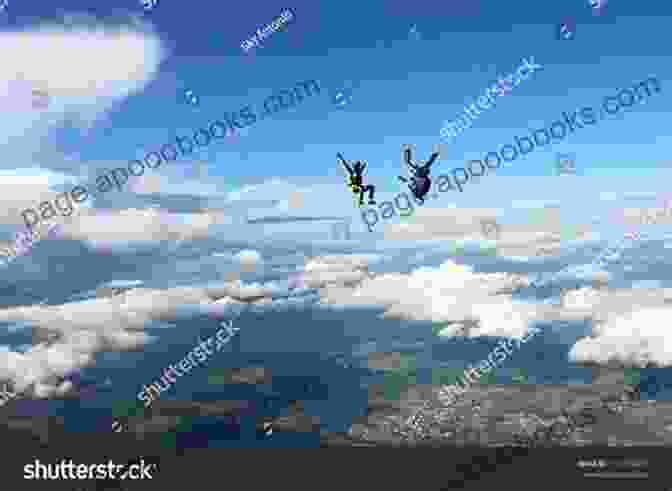 Two Skydivers Free Falling Against A Breathtaking Backdrop Of Clouds Skydive Michel Marc Bouchard